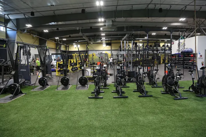 Turf training area with strength machines